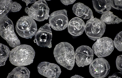 Hollow glass microspheres for adhesives compounds